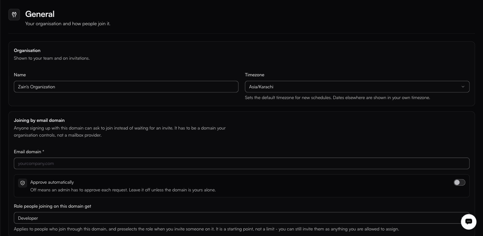 General settings: an Organisation block holding the organisation Name and Timezone Asia/Karachi, then Joining by email domain with an empty Email domain field, Approve automatically off, and the joining role set to Developer
