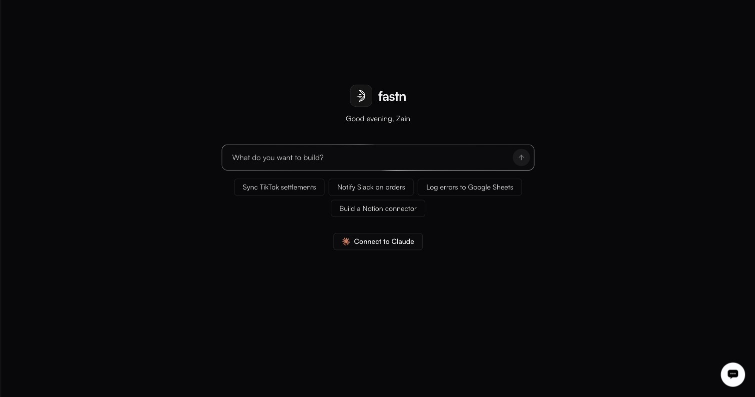The Home screen, with a Connect to Claude button below the four suggestion chips and the What do you want to build? prompt box, under a time-of-day greeting